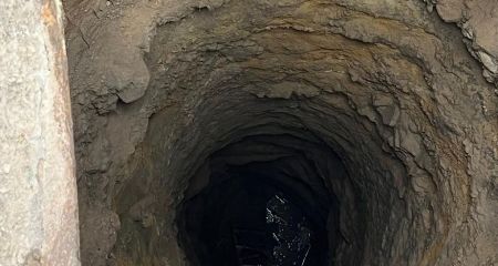 На Дніпропетровщині мешканці села з поліцейським витягали чоловіка з колодязя (ФОТО, ВІДЕО)