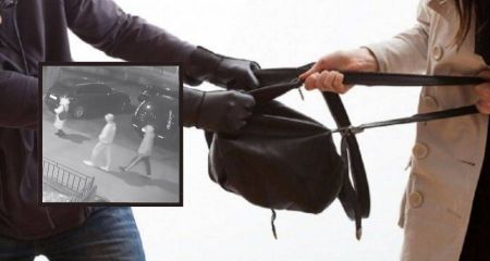 Напали та тягли по землі: у Дніпрі двоє молодиків серед вулиці пограбували жінку (ВІДЕО)