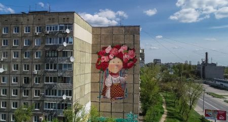 У Дніпрі через утеплення будинку можуть знищити знаменитий мурал